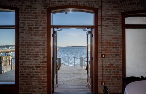 Port Townsend Apartment | Historic Town View Room with bay window overlooking Water Street
