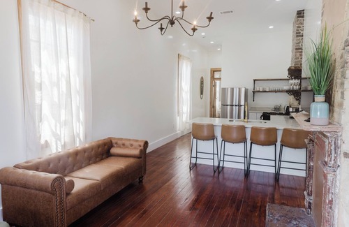 Faubourg Delassize House | historic uptown shotgun off st Charles ave