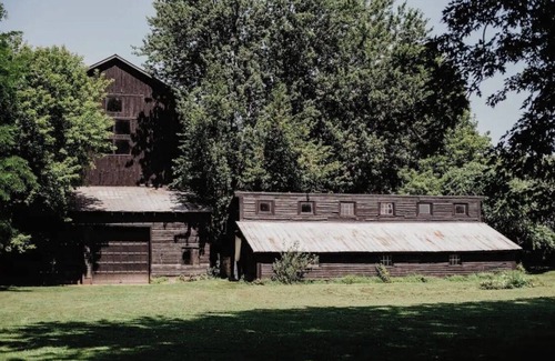 Sennett House | Historic Victorian farmhouse house on 10 acres in the FLX.