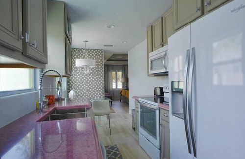 Gulfport Villa | Historic Waterfront District- Gulfport Florida, includes pool, grill and bikes!