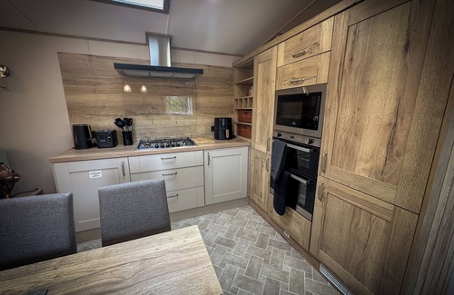 Longridge Cabin | Hobbit - House Of The Owl.nLuxury lodge with views. Pet friendly. Indoor Pool.