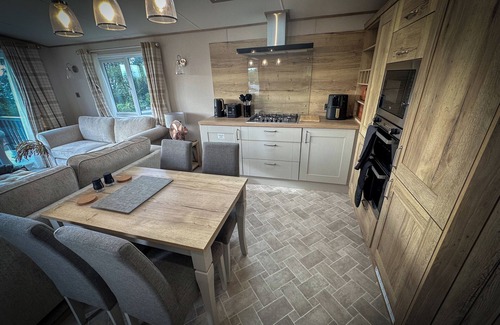 Longridge Cabin | Hobbit - House Of The Owl.nLuxury lodge with views. Pet friendly. Indoor Pool.