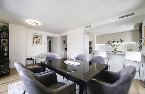 Cornella de Llobregat Apartment | Holiday Apartment "Sunsets and The Pool In Barcelona" with Balcony, Shared Pool & Wi-Fi