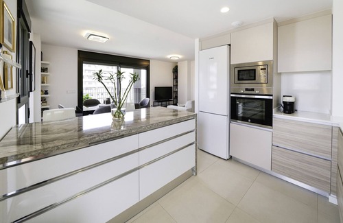 Cornella de Llobregat Apartment | Holiday Apartment "Sunsets and The Pool In Barcelona" with Balcony, Shared Pool & Wi-Fi