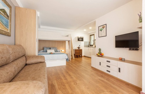 Llinars del Valles Apartment | Holiday Apartment "Armonia Estudio, Comparte Exterior" with Mountain View, Shared Pool & Wi-Fi