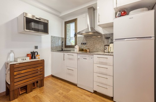 Llinars del Valles Apartment | Holiday Apartment "Armonia Estudio, Comparte Exterior" with Mountain View, Shared Pool & Wi-Fi