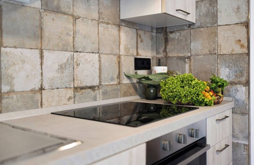 Andora Apartment | Holiday Apartment "Antichi Ricordi - La Stalla" with Terrace, Shared Pool & Wi-Fi