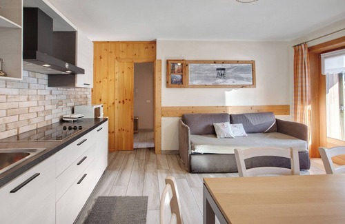 San Rocco Apartment | Holiday Apartment 'Baita Doss' with Mountain View, Balconies & Wi-Fi