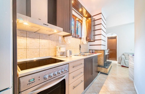 Argyrades Apartment | Holiday Apartment "Chara's Holiday Home" with Garden, Terraces & Wi-Fi