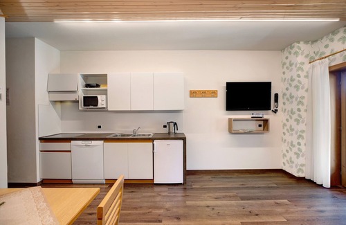 Tesero Apartment | Holiday Apartment "Foresto Bilocale" with Mountain View, Pool, Sauna & Garden