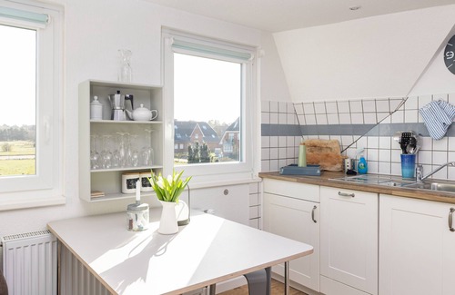 Norddorf Apartment | Holiday apartment, island holidays, sea view, island view, garden, beach chair,