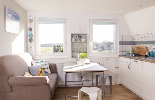 Norddorf Apartment | Holiday apartment, island holidays, sea view, island view, garden, beach chair,