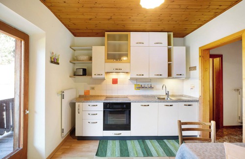 Redagno Apartment | Holiday Apartment "Pischlhof Apt Lärche" with Mountain View, Balcony & Shared Garden