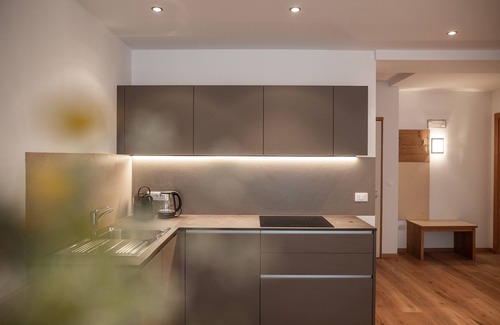 Santa Valburga Apartment | Holiday Apartment 'Pöder Flimkanzel' with Mountain View, Balcony, Shared Garden & Wi-Fi