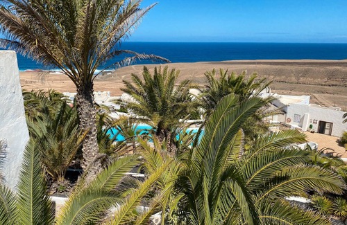 Betancuria Apartment | Holiday Apartment 'Sonneninsel Fuerteventura' with Sea View, Communal Pool and Wi-Fi
