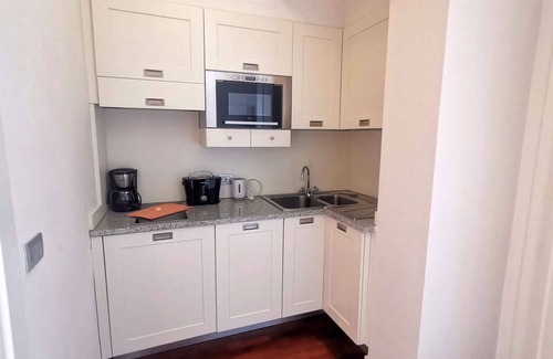Meina Apartment | Holiday apartment with air conditioning and WLAN