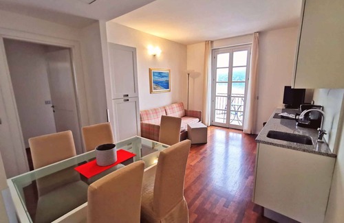 Meina Apartment | Holiday apartment with balcony, air conditioning and wifi
