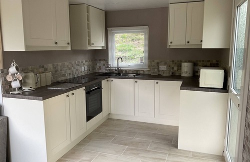 Bont Newydd House | Holiday Cabin Sleeps 5 Glan Gwna Holiday Park