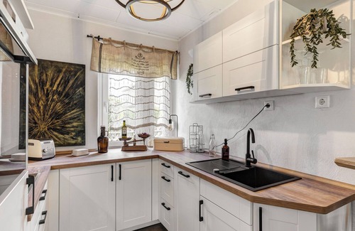 Mullrose House | Holiday Home 'Am See' with Private Terrace, Private Garden and Wi-Fi