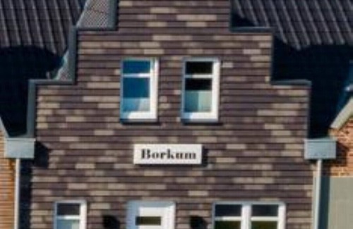 Barssel House | Holiday home "Borkum" with 88sqm - in the holiday park Harkebrügge