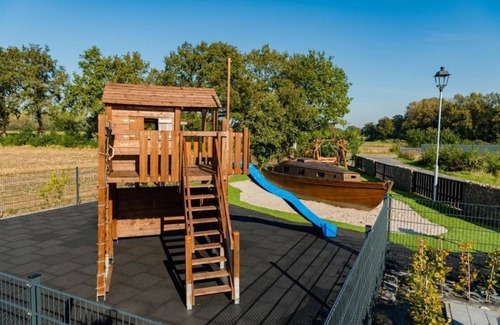 Barssel House | Holiday home "Borkum" with 88sqm - in the holiday park Harkebrügge