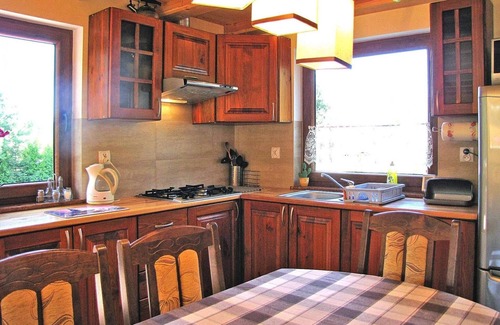 Wilkasy House | Holiday Home by Lake Wilkasy with Rowboat
