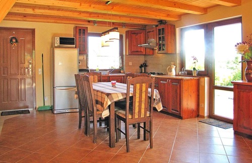 Wilkasy House | Holiday Home by Lake Wilkasy with Rowboat