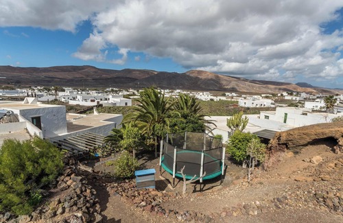 Guatiza House | Holiday Home Casa Cueva with Mountain View, Pool, Wi-Fi & Terrace