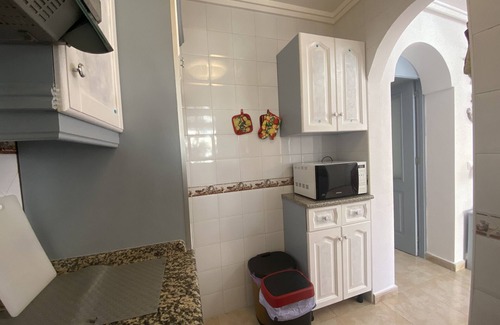 San Fulgencio House | Holiday Home 'Casa Palma' with Shared Pool, Wi-Fi and Air Conditioning