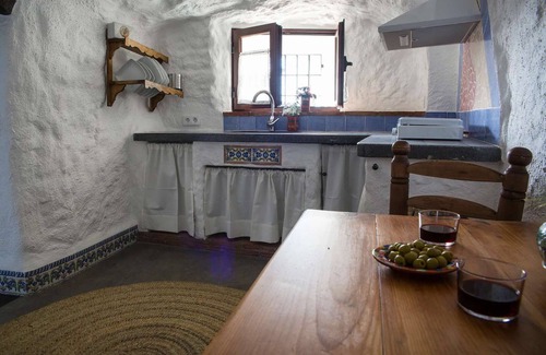 Los Balcones House | Holiday Home 'Cuevas Balcones de Piedad - Acacia' with Terrace, Shared Pool & Wi-Fi
