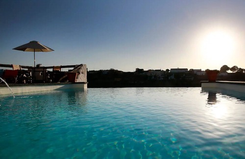 Los Balcones House | Holiday Home 'Cuevas Balcones de Piedad - Acacia' with Terrace, Shared Pool & Wi-Fi