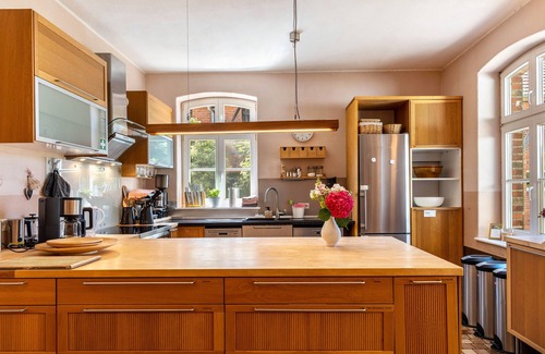 Werben House | Holiday Home 'Der Flusshof, Ferienhaus' with Shared Terrace, Shared Garden and Wi-Fi