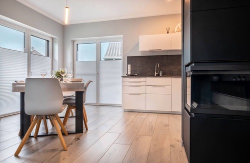 Barssel House | Holiday Home 'Ferienhaus Am See Mit Sauna' with Private Terrace, Private Garden and Wi-Fi
