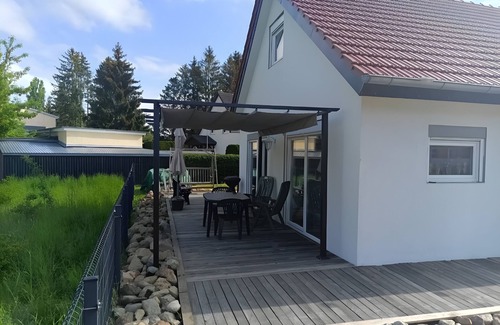 Warin House | Holiday Home 'Ferienhaus Schw Agnes' with Lake View, Private Terrace and Wi-Fi