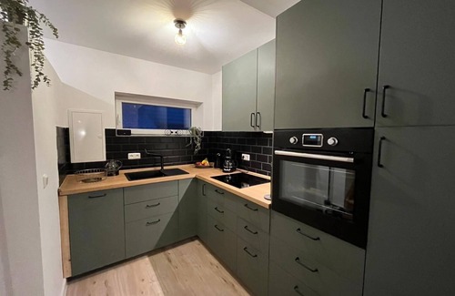 Maasholm House | Holiday Home 'Fischer-chic - Die Bude' with Sea View, Private Terrace and Wi-Fi