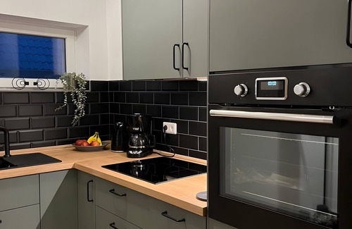 Maasholm House | Holiday Home 'Fischer-chic - Die Bude' with Sea View, Private Terrace and Wi-Fi