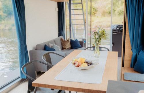 Merzig House | Holiday Home Floating Home-Hausboot in Merzig liegend by Interhome