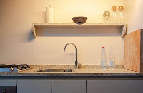 Cortona Apartment | Holiday Home 'Frantoio 5 Superior' with Shared Pool, Wi-Fi and Air Conditioning