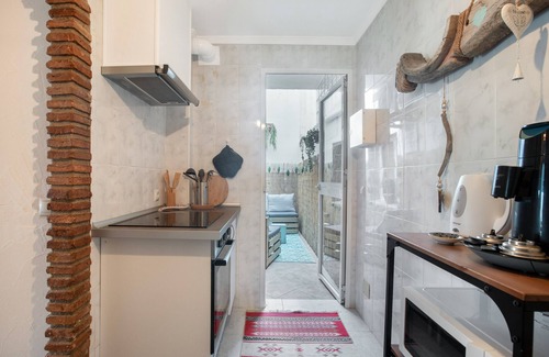 Benalmadena House | Holiday Home 'Gecko' with Private Terrace, Wi-Fi and Air Conditioning