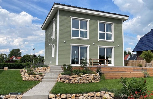 Bedekaspel House | Holiday Home 'Haus Am Meer 8' with Lake View, Private Terrace and Private Garden