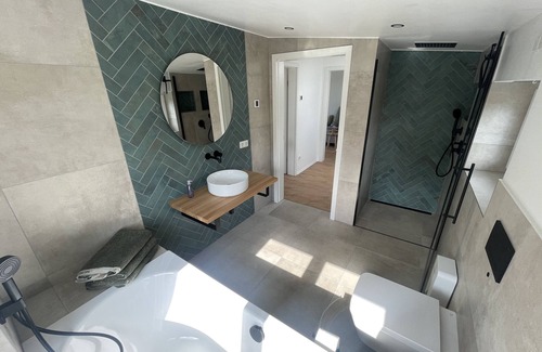 Bedekaspel House | Holiday Home 'Haus Am Meer 8' with Lake View, Private Terrace and Private Garden