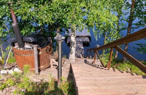 Enonkoski House | Holiday Home Hot pool cottage iitu by Interhome