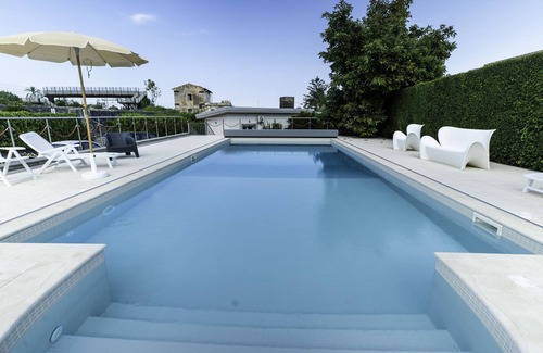 Carruba House | Holiday Home 'Tropical House' with Sea View, Private Pool & Wi-Fi