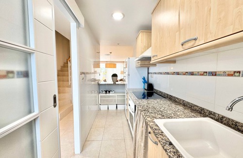Playa de Almarda House | Holiday Home 'Lopimar Playa' with Mountain View, Wi-Fi and Air Conditioning