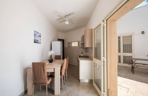 Sant'Isidoro House | Holiday Home 'Luna Di Mare' with Sea View, Shared Terrace and Air Conditioning