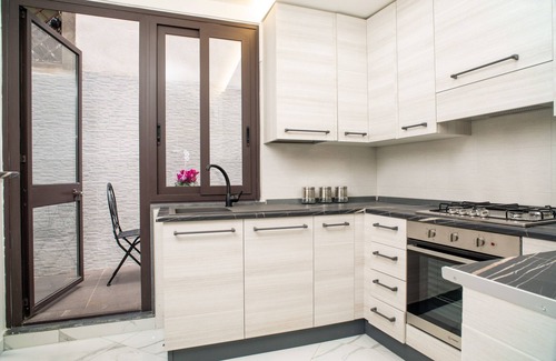 Aci Castello House | Holiday Home 'Manuela House ' with Private Terrace and Air Conditioning