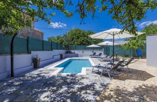 Sajini House | Holiday Home Reaa by Interhome
