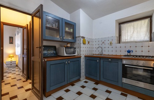 Pischina Salida House | Holiday Home 'Residence Capo Caccia Alghero' with Shared Pool and Private Terrace
