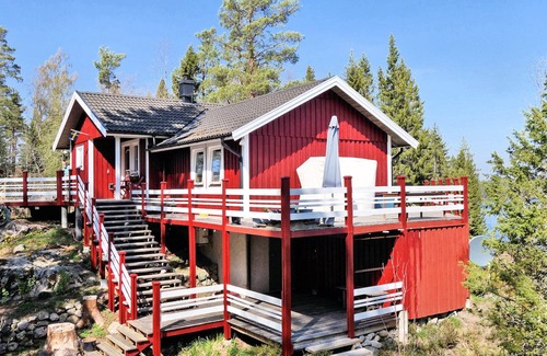Tived House | Holiday home Tived - directly on lake, sauna, boat, hot tub