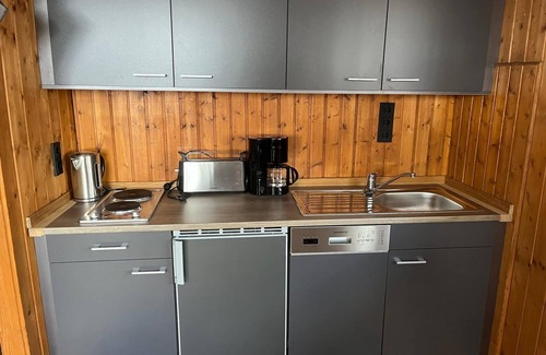 Grainet House | Holiday Home 'Urige Idyllische Hütte Mit Sauna' with Private Garden